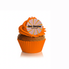 Cupcake with orange frosting and a decorative topper on a white background